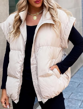 stella-_-women_s-sleeveless-puffer-vest-53bb689b-ef02-43b9-8afe-4ad1df60ef4e.png